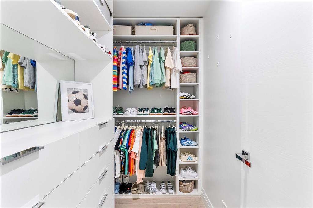 9 Tahoe Lane Sea Ranch Lakes, FL 33308 - Photo 51 of 99 a view of walk in closet with clothes and shoes