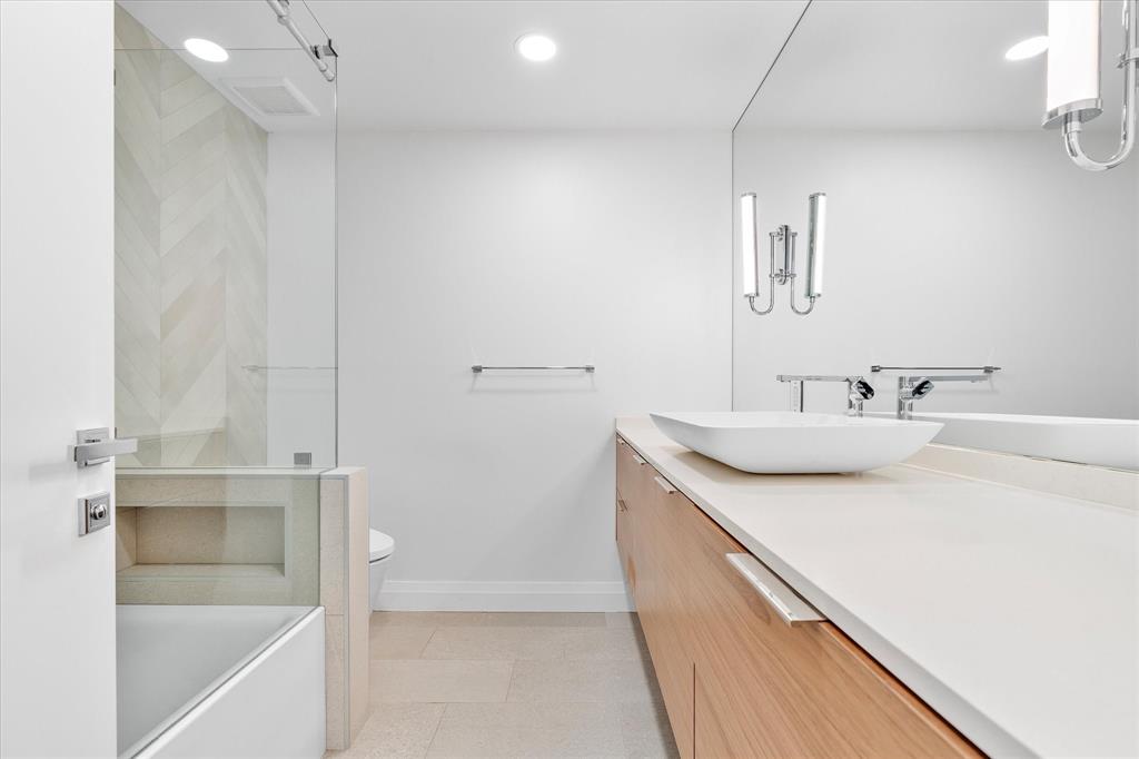 9 Tahoe Lane Sea Ranch Lakes, FL 33308 - Photo 52 of 99 a bathroom with a sink and a mirror