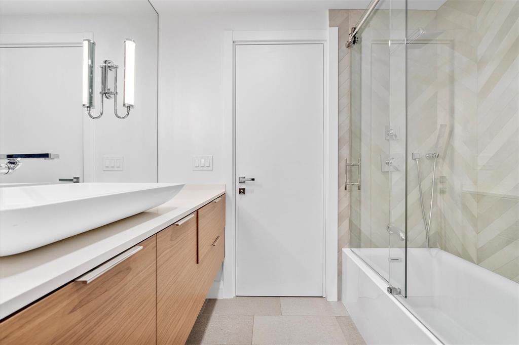 9 Tahoe Lane Sea Ranch Lakes, FL 33308 - Photo 53 of 99 a bathroom with a bathtub and a sink