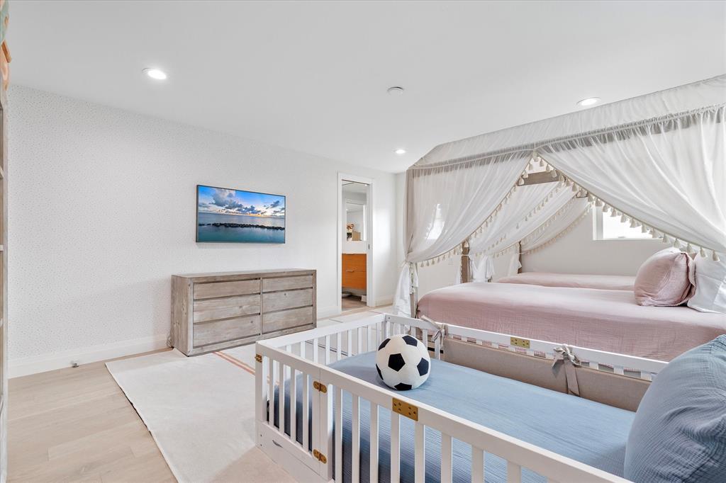 9 Tahoe Lane Sea Ranch Lakes, FL 33308 - Photo 55 of 99 a bed room with furniture and a window