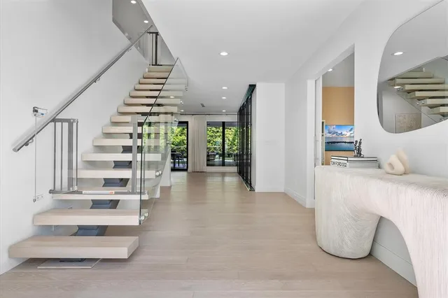 a living room with furniture and windows