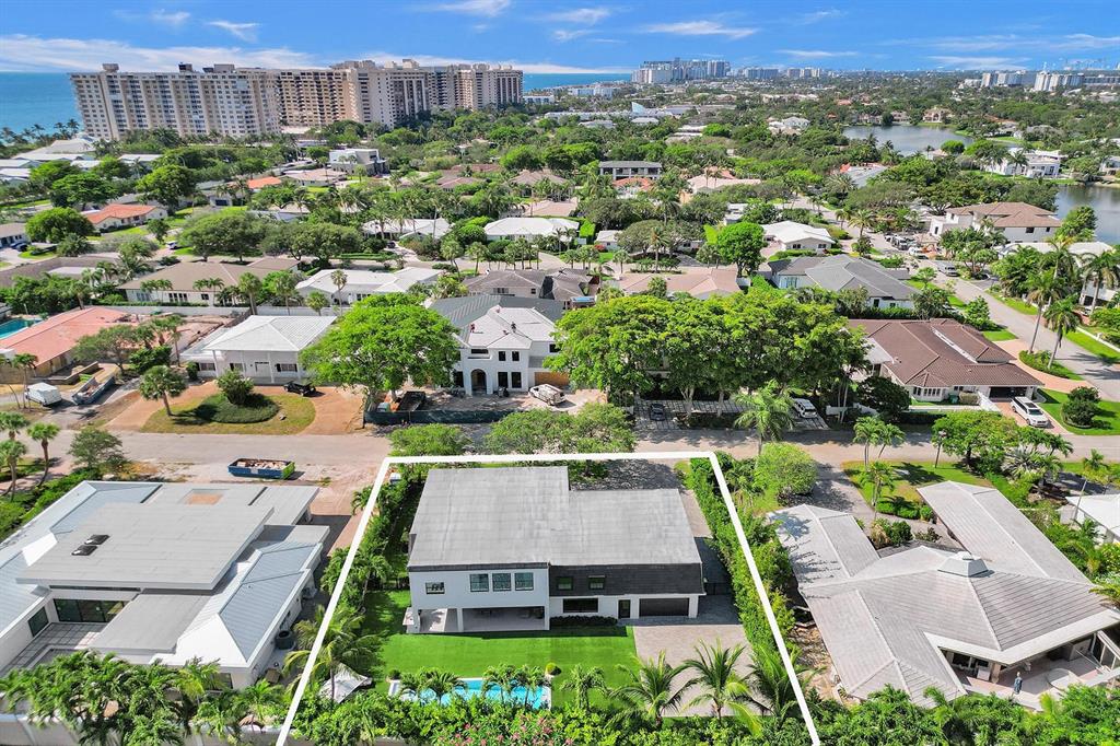 9 Tahoe Lane Sea Ranch Lakes, FL 33308 - Photo 72 of 99 an aerial view of a house with a garden
