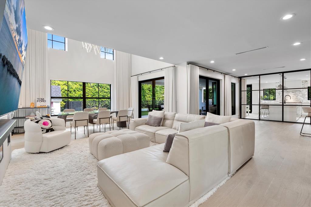 9 Tahoe Lane Sea Ranch Lakes, FL 33308 - Photo 8 of 99 a living room with furniture and windows