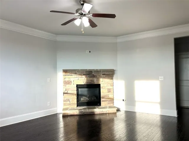 a kitchen with kitchen island a counter space a sink appliances and cabinets