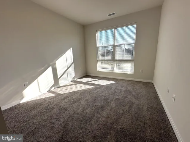 a view of empty room with window
