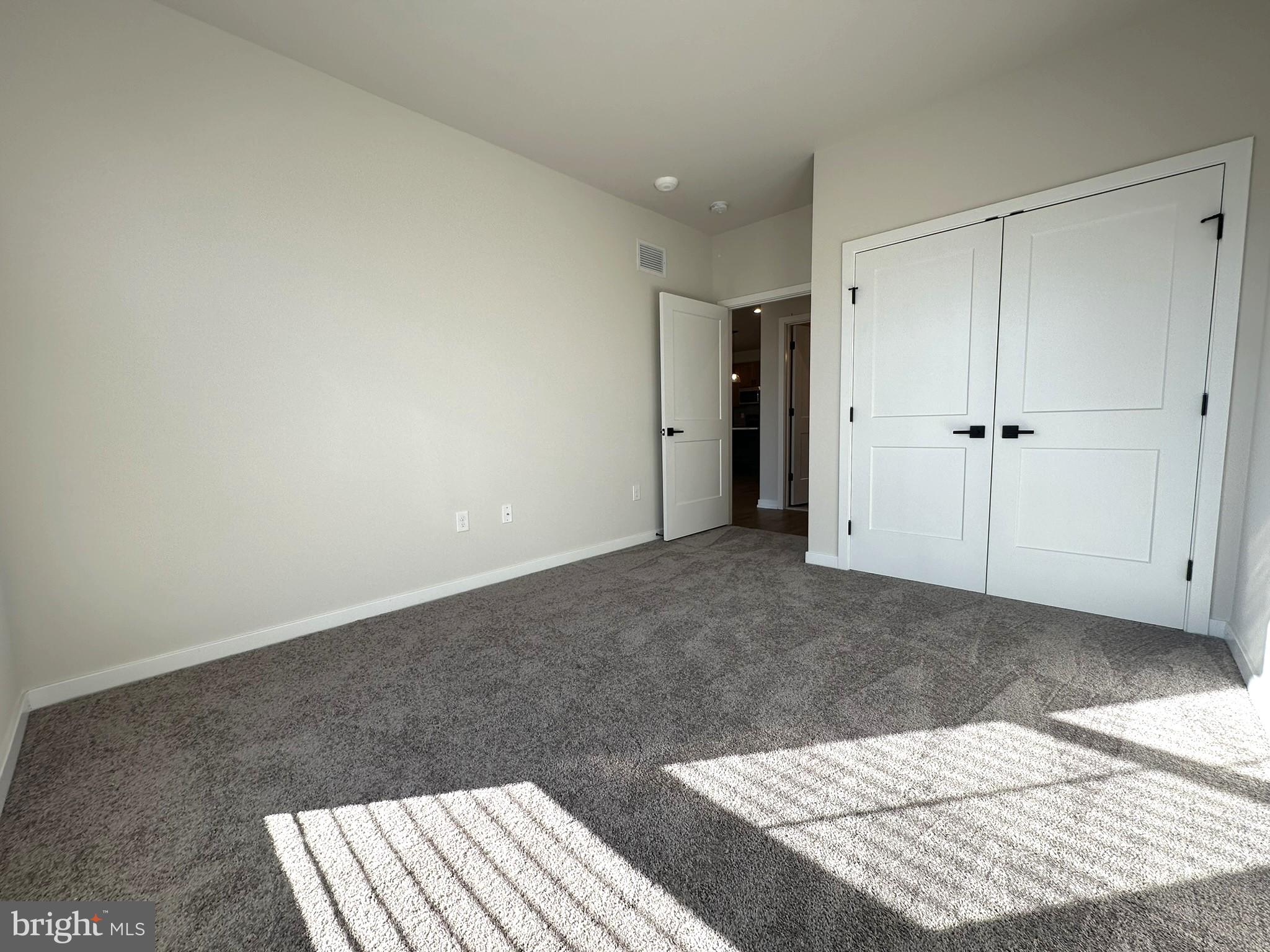 409 West Butler Avenue, Unit 223 Chalfont, PA 18914 - Photo 21 of 33 a view of an empty room