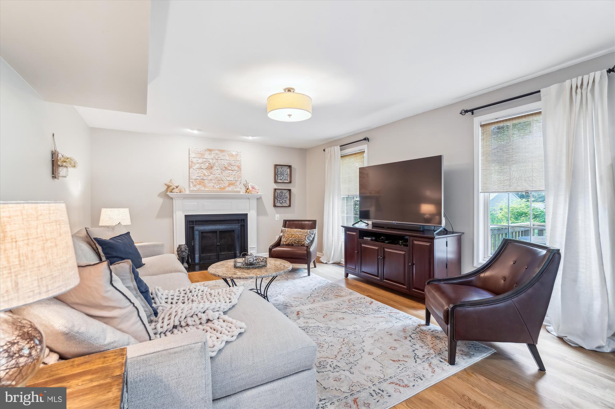 1043 Skyview Drive Annapolis, MD 21409 - Photo 15 of 71 a living room with furniture and a flat screen tv