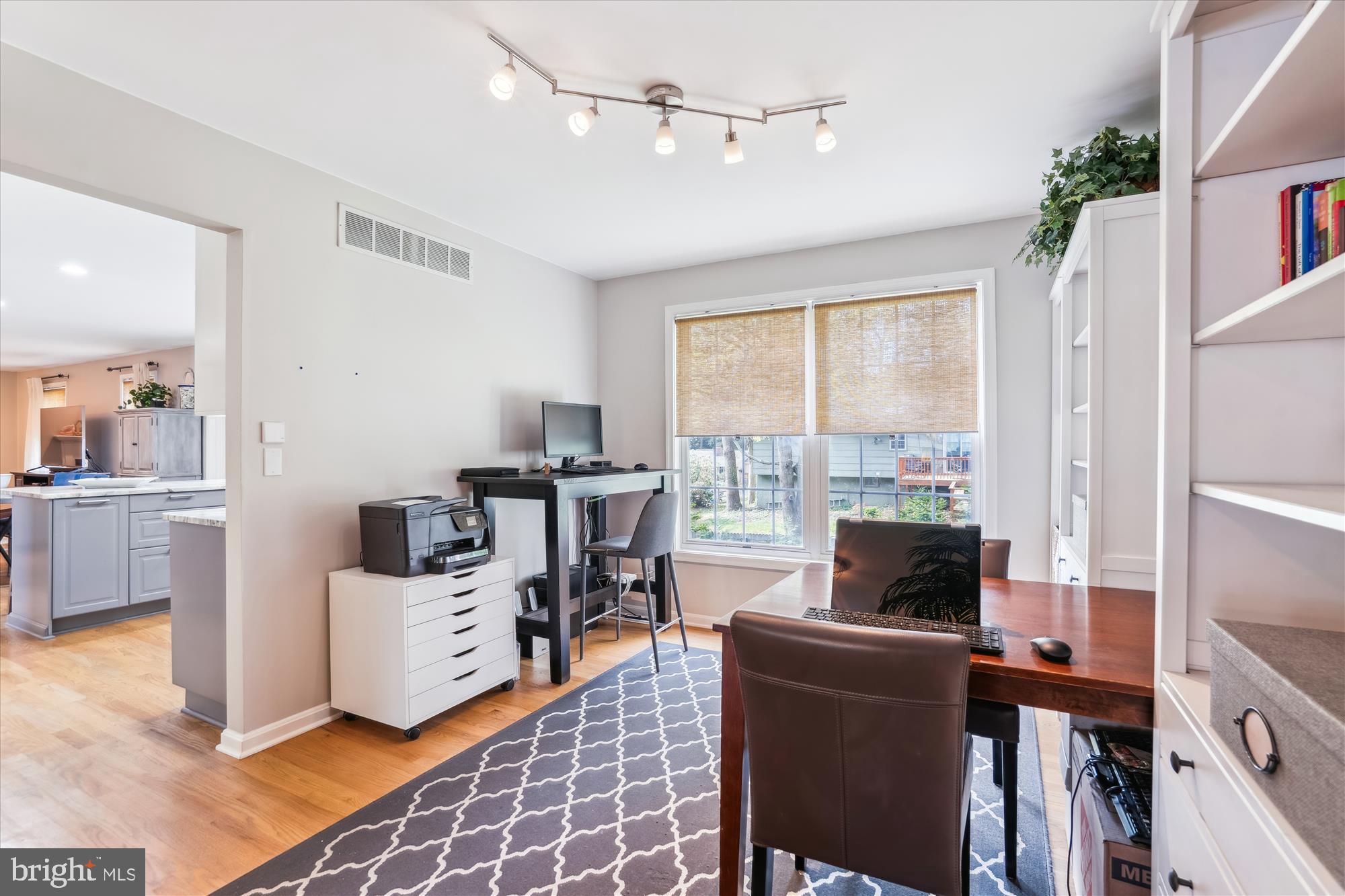 1043 Skyview Drive Annapolis, MD 21409 - Photo 22 of 71 a living room with furniture and a floor to ceiling window