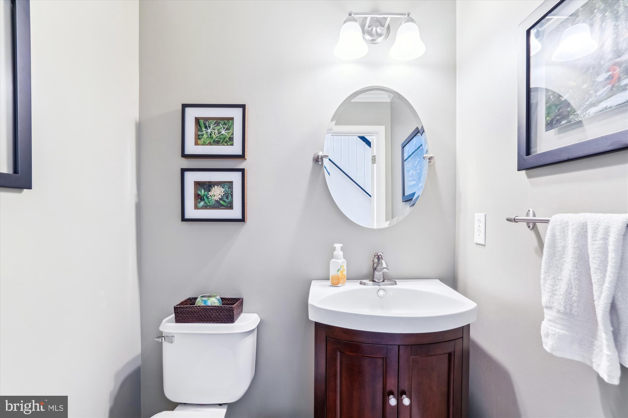 1043 Skyview Drive Annapolis, MD 21409 - Photo 31 of 71 a bathroom with a toilet sink and mirror