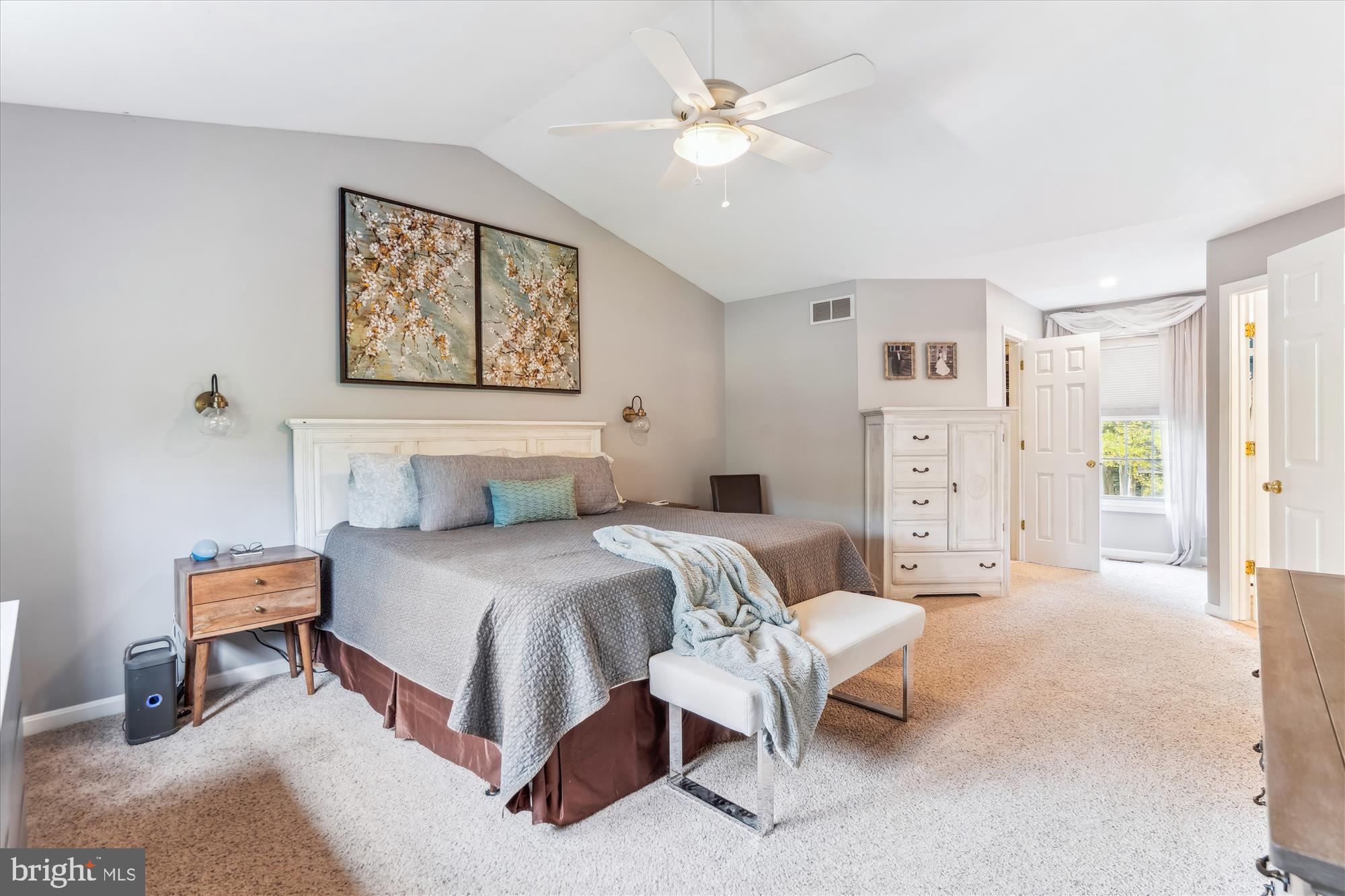 1043 Skyview Drive Annapolis, MD 21409 - Photo 34 of 71 a spacious bedroom with a bed and a chandelier