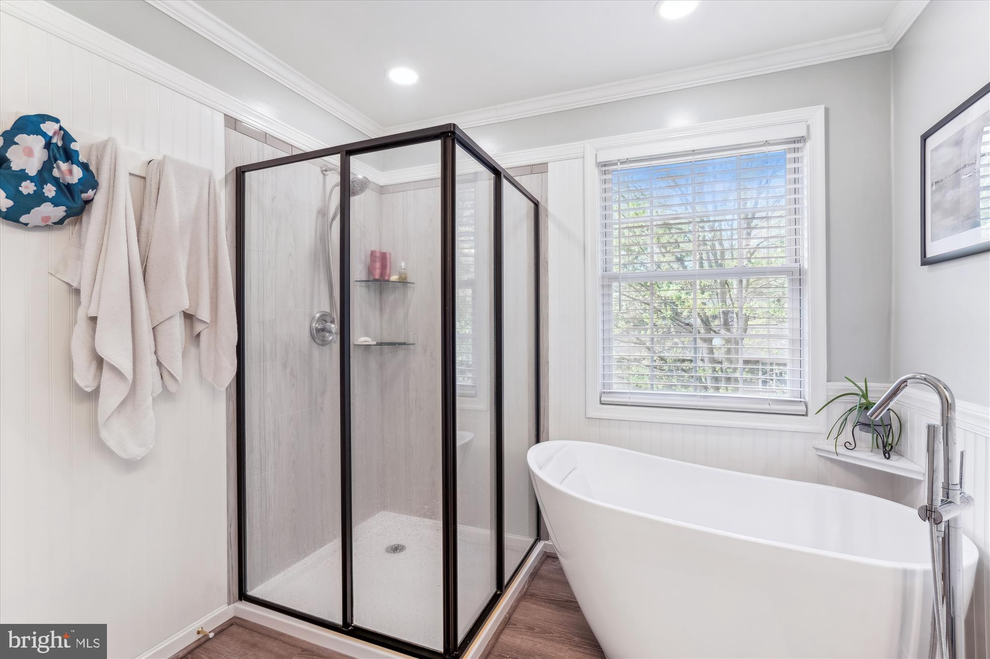 1043 Skyview Drive Annapolis, MD 21409 - Photo 37 of 71 a bathroom with a tub sink and mirror