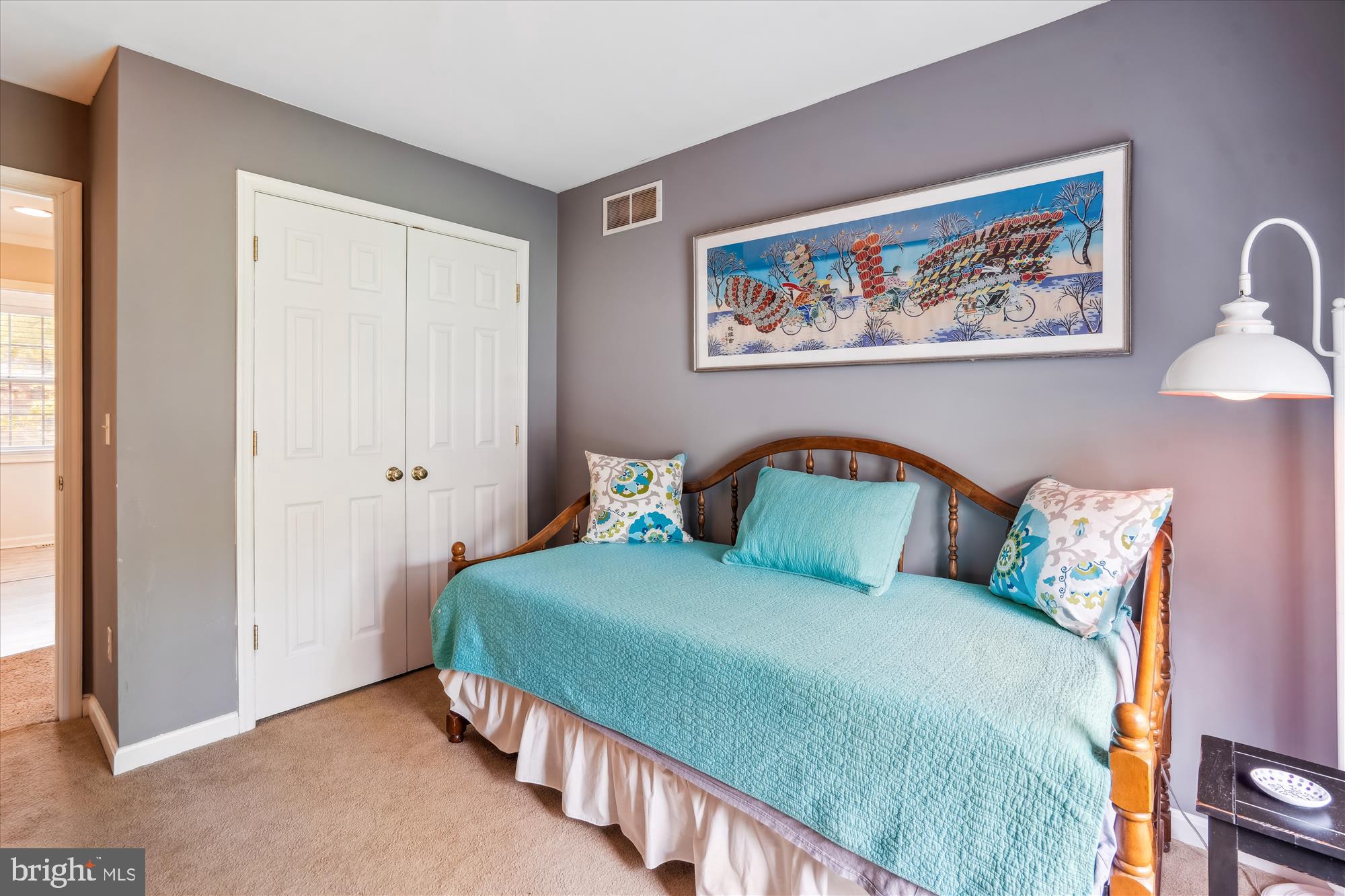 1043 Skyview Drive Annapolis, MD 21409 - Photo 51 of 71 a bedroom with 2 bed and a painting on the wall