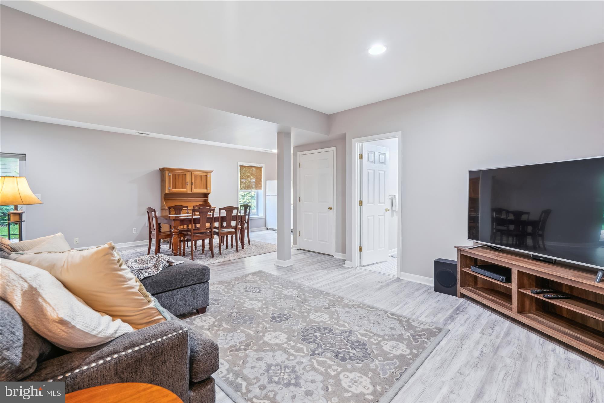 1043 Skyview Drive Annapolis, MD 21409 - Photo 52 of 71 a living room with furniture and a flat screen tv