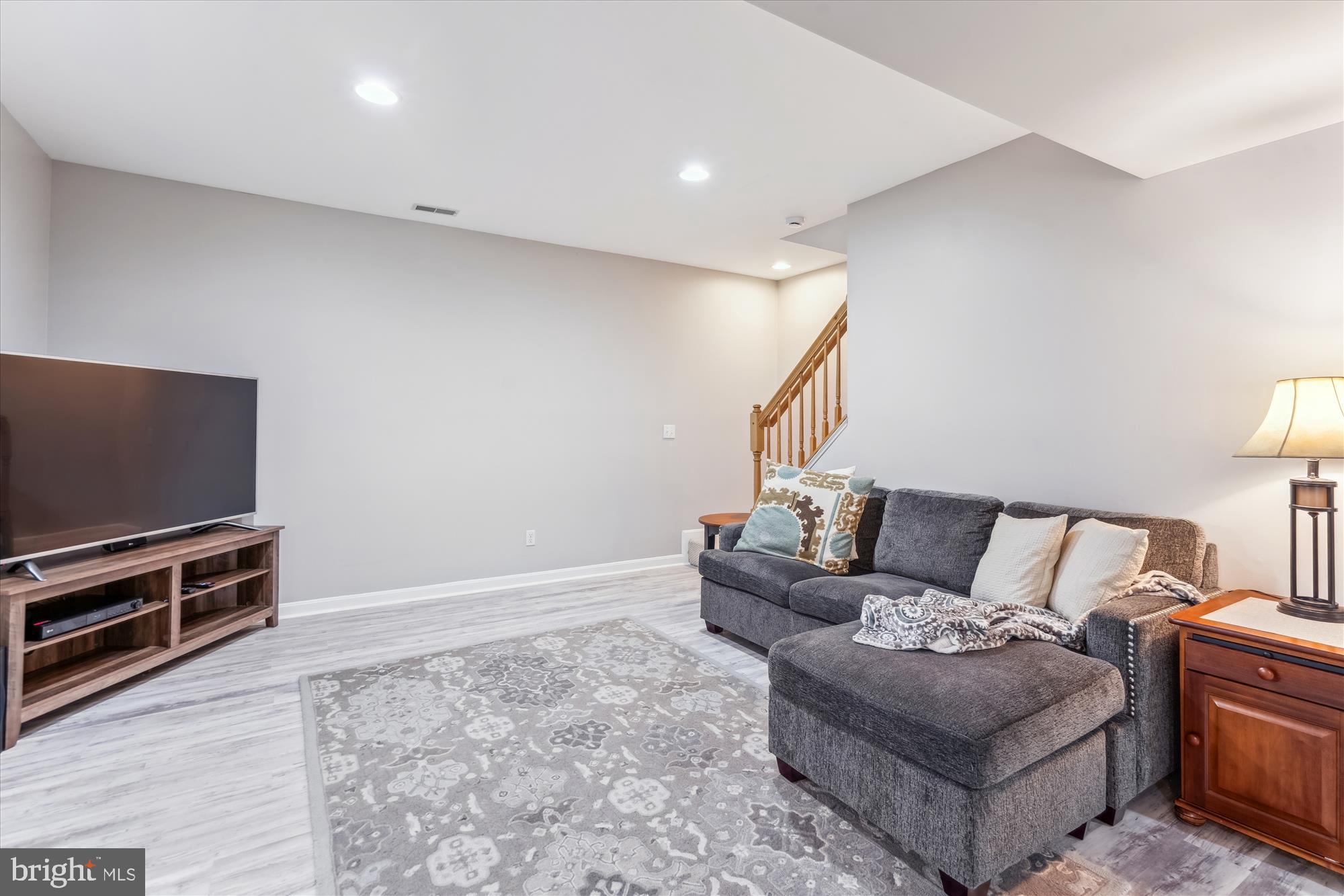 1043 Skyview Drive Annapolis, MD 21409 - Photo 54 of 71 a living room with furniture and a flat screen tv