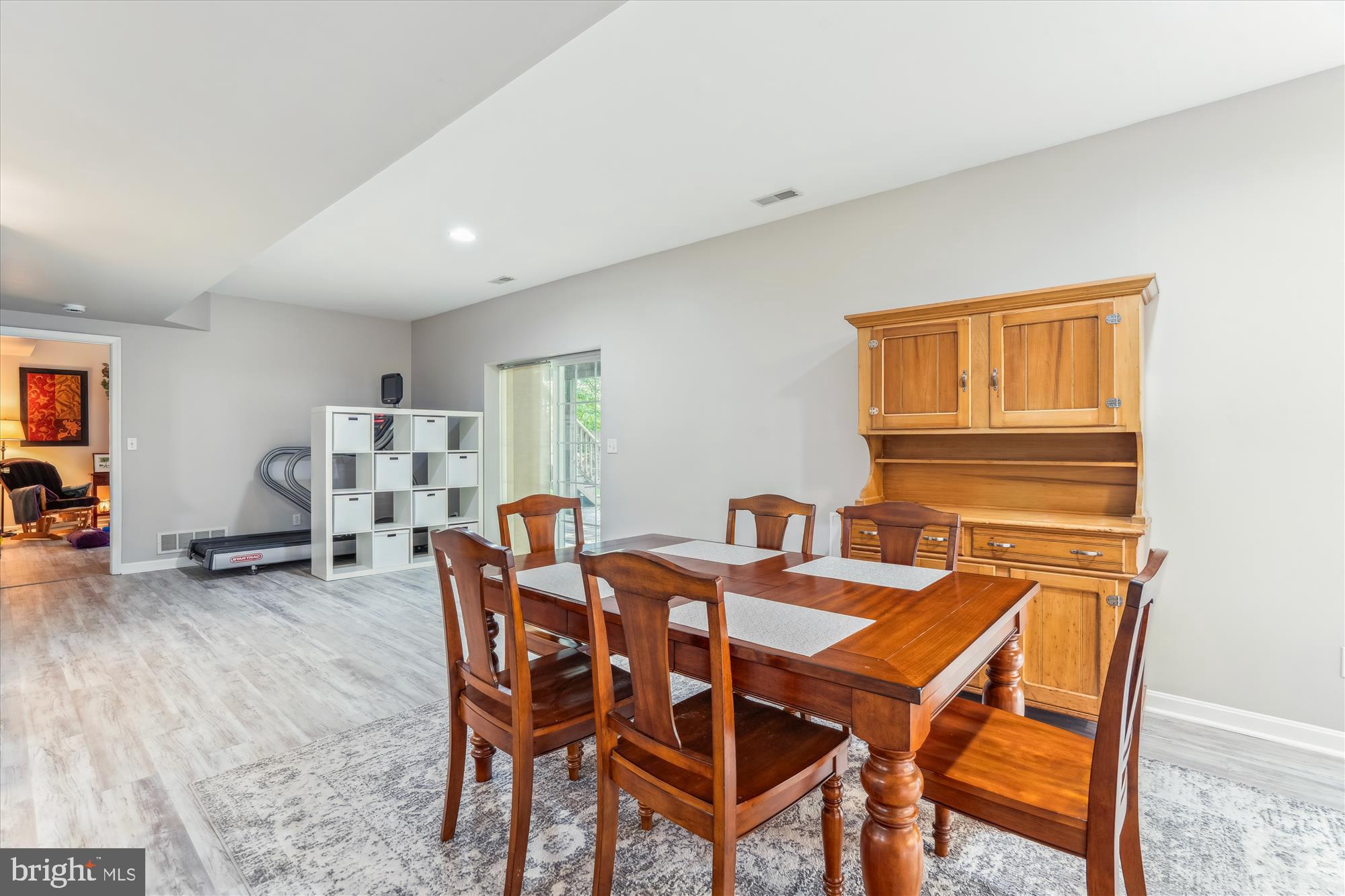 1043 Skyview Drive Annapolis, MD 21409 - Photo 56 of 71 a view of a dining room with furniture and a potted plant