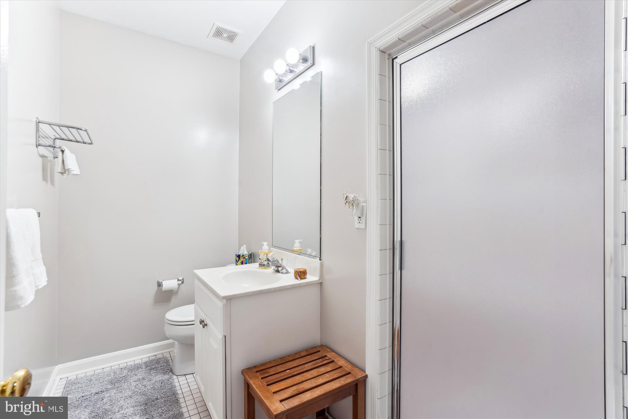 1043 Skyview Drive Annapolis, MD 21409 - Photo 61 of 71 a bathroom with a sink and a mirror