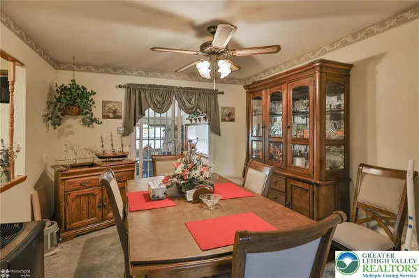 a room with furniture and a flat screen tv
