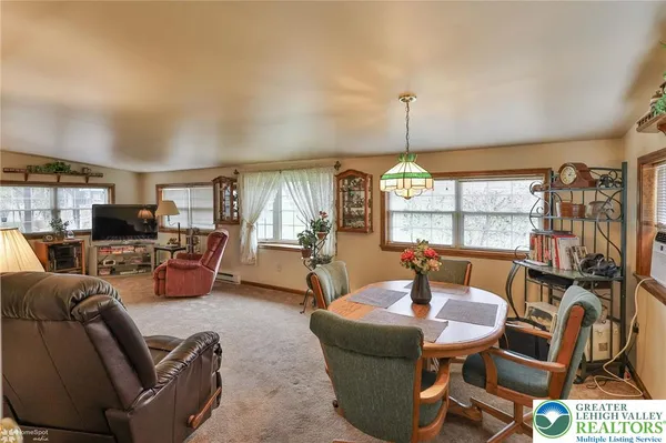 a living room with furniture and a couch