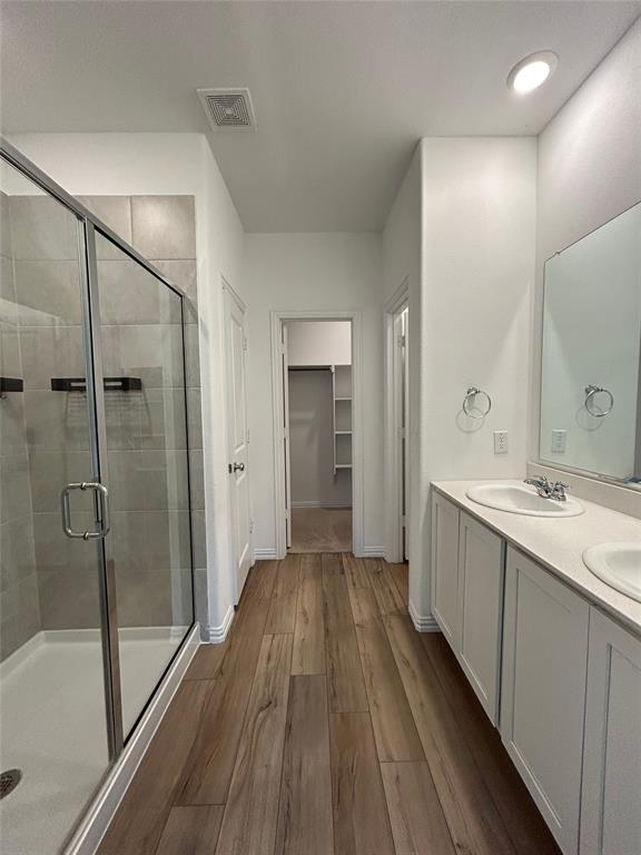 213 Post Oak Street Azle, TX 76020 - Photo 21 of 24 a bathroom with a sink and shower