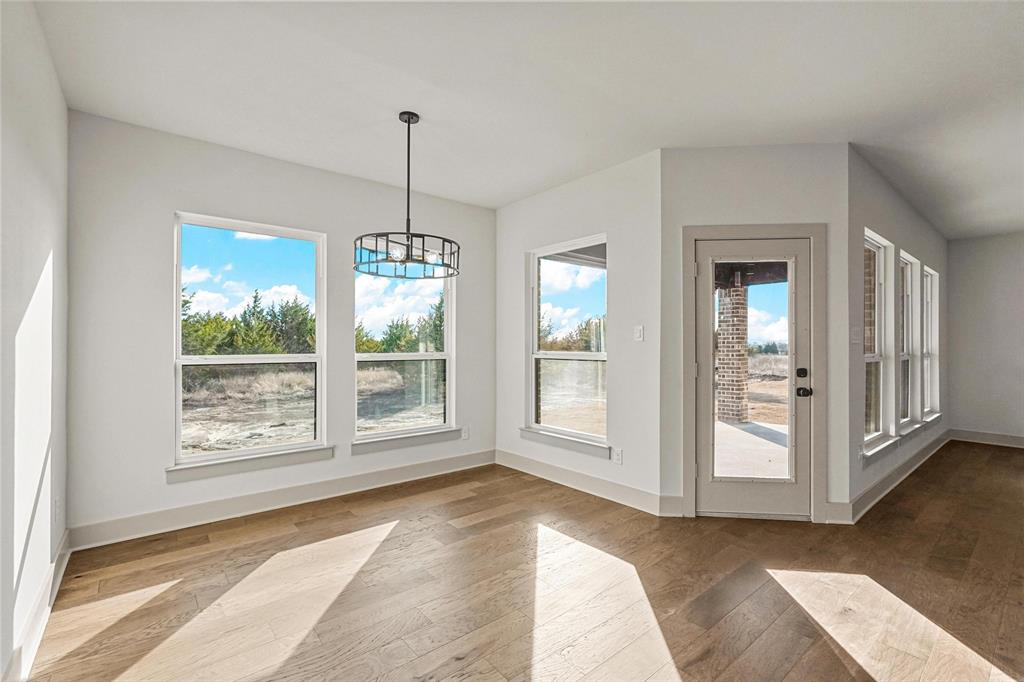 730 Evergreen Nevada, TX 75173 - Photo 13 of 40 a view of an empty room with glass door