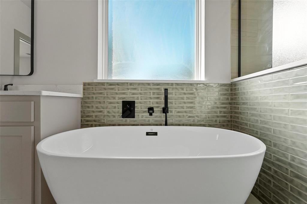 730 Evergreen Nevada, TX 75173 - Photo 24 of 40 a bathroom with sink and mirror