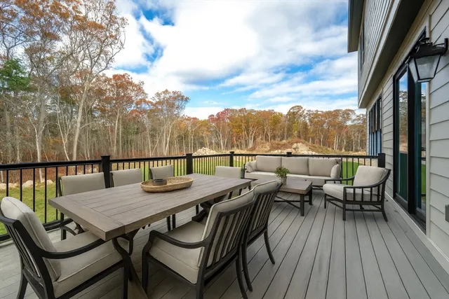 a view of a swimming pool with a yard and mountain view