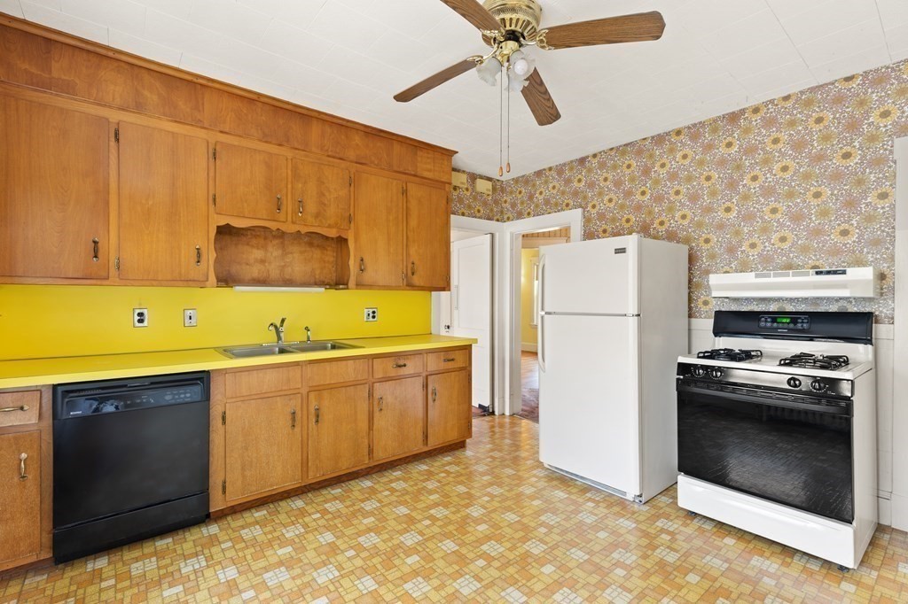 24 Fairbanks Road Milton, MA 02186 - Photo 15 of 19 a kitchen with a sink appliances and cabinets