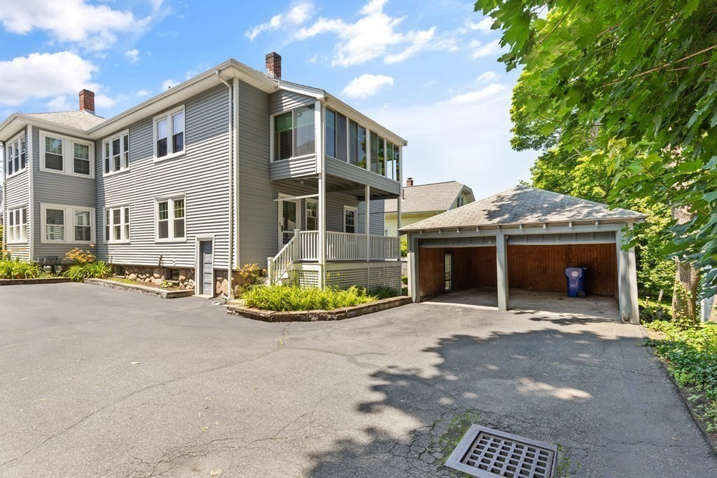 24 Fairbanks Road Milton, MA 02186 - Photo 19 of 19 a view of a white house with a outdoor space