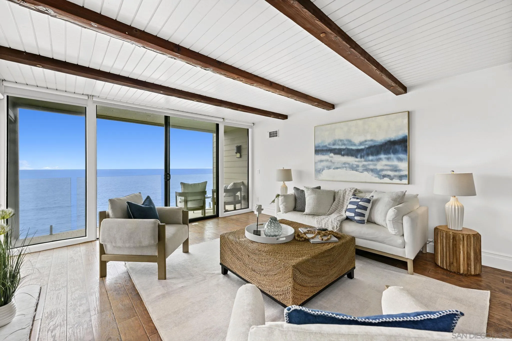 337 West I Street Encinitas, CA 92024 - Photo 13 of 58 a living room with furniture and a large window