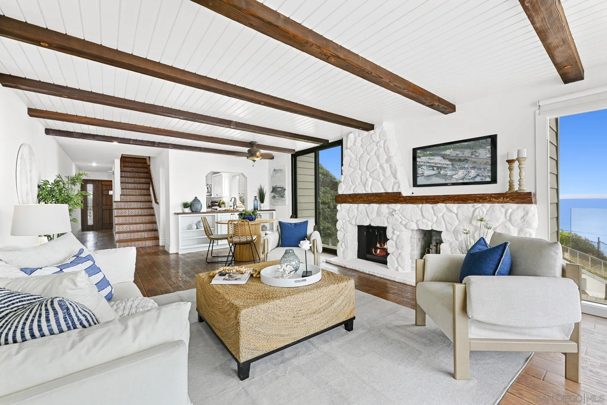 337 West I Street Encinitas, CA 92024 - Photo 14 of 58 a living room with furniture and a fireplace