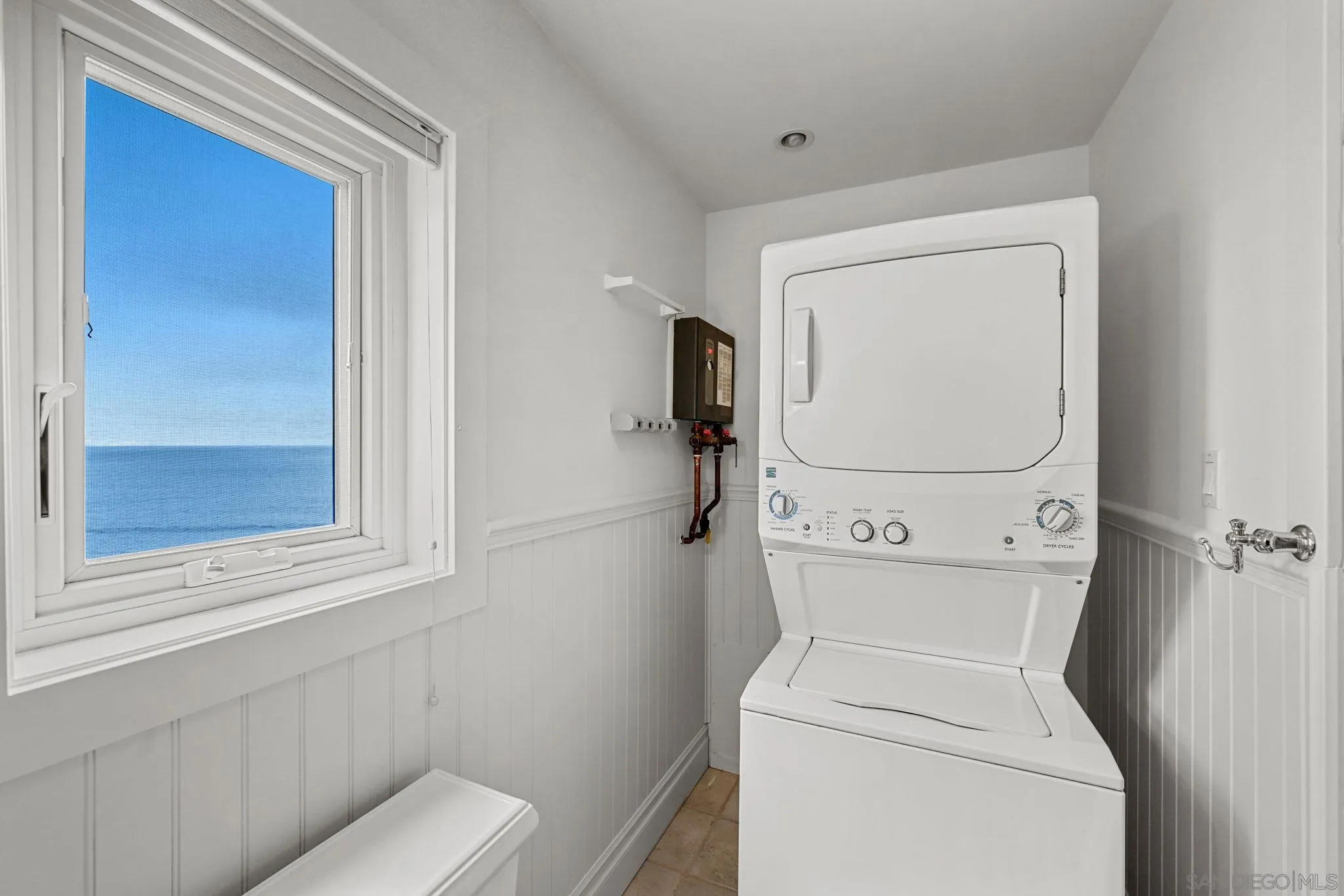 337 West I Street Encinitas, CA 92024 - Photo 26 of 58 a utility room with dryer and washer