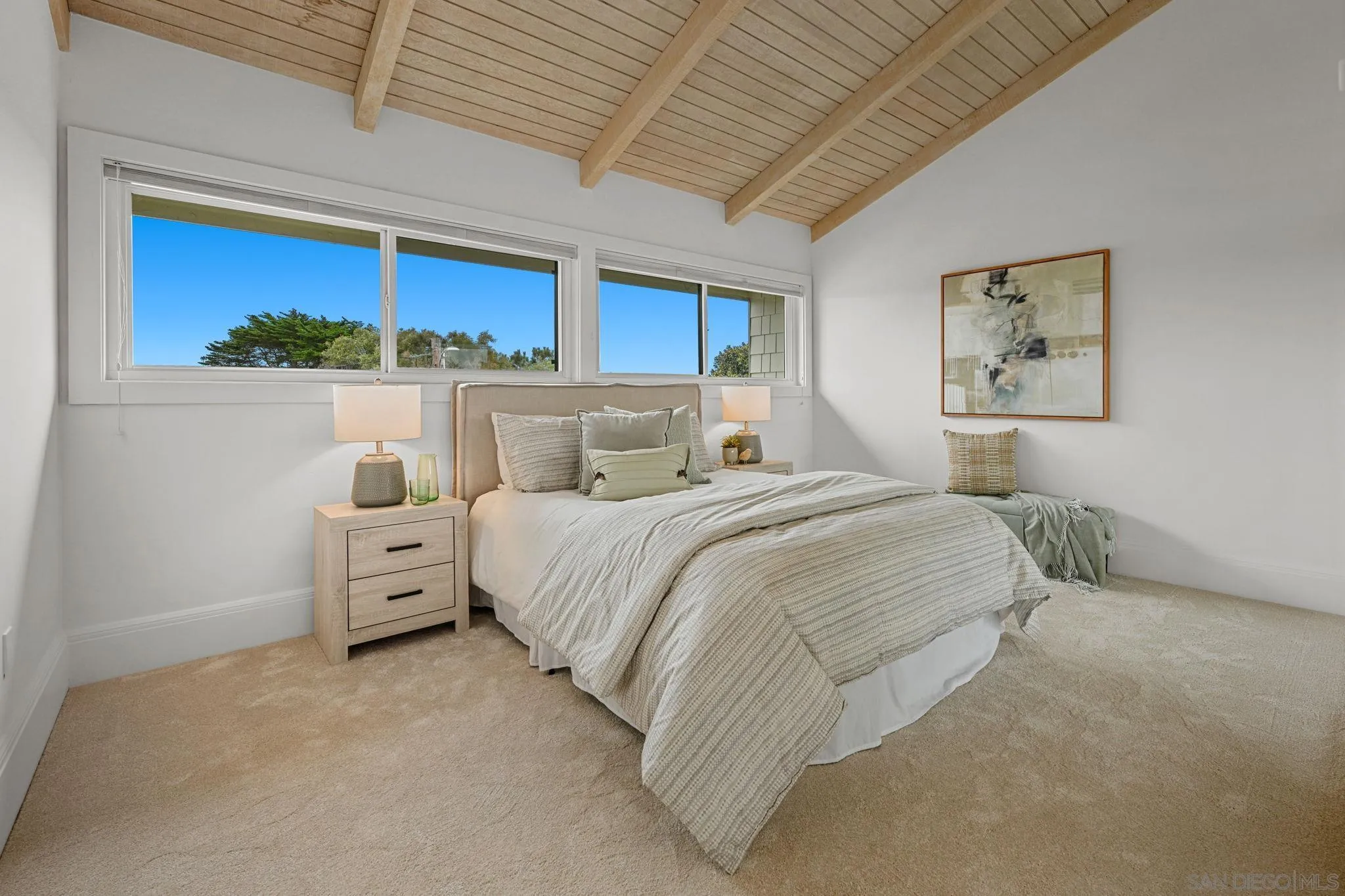 337 West I Street Encinitas, CA 92024 - Photo 27 of 58 a bed room with furniture and a large window