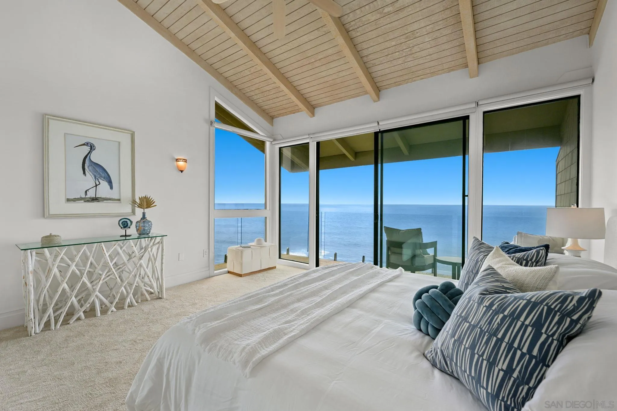 337 West I Street Encinitas, CA 92024 - Photo 30 of 58 a bedroom with a large bed and a balcony