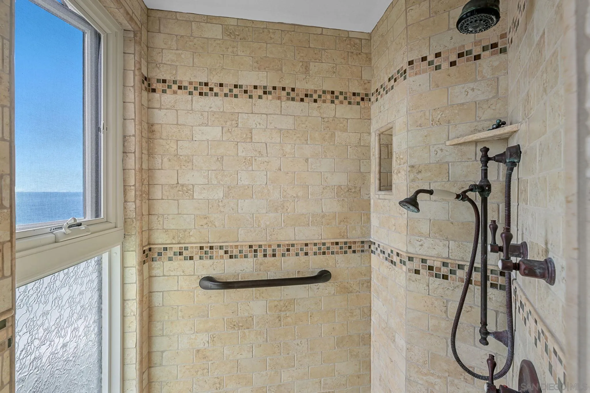 337 West I Street Encinitas, CA 92024 - Photo 39 of 58 a bathroom with a shower