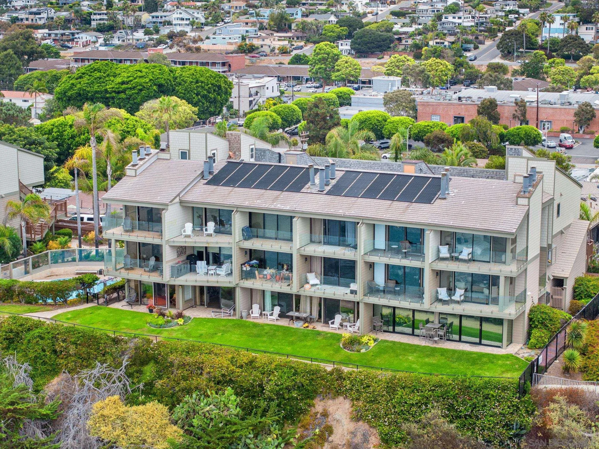 337 West I Street Encinitas, CA 92024 - Photo 56 of 58 a view of a house with a yard and plants