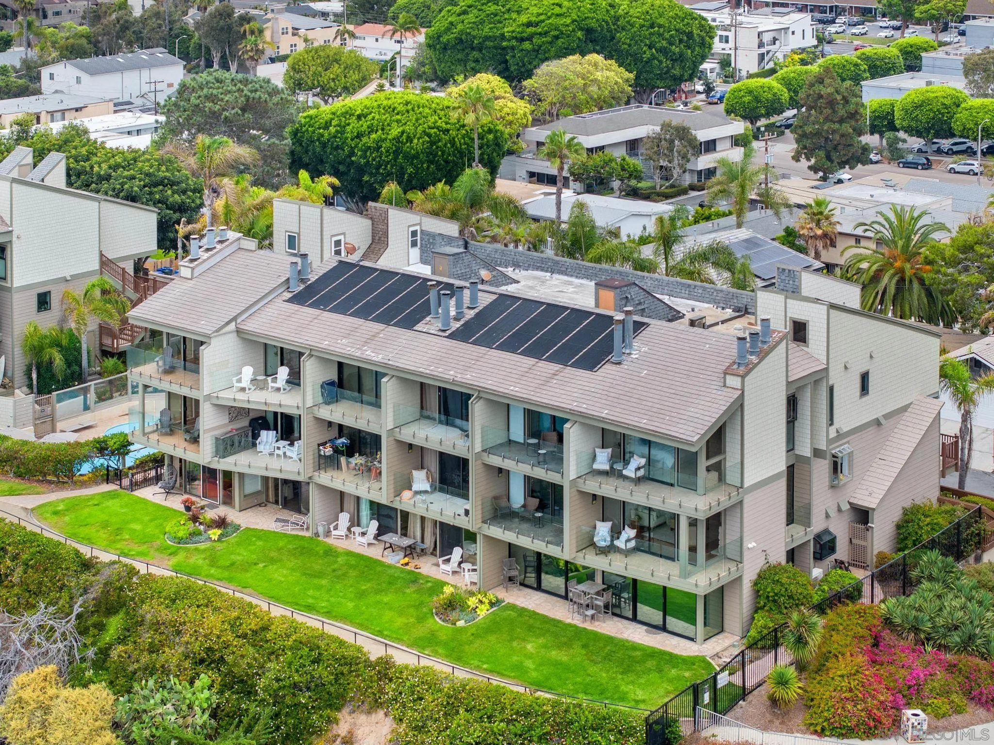 337 West I Street Encinitas, CA 92024 - Photo 57 of 58 an aerial view of multiple houses with yard