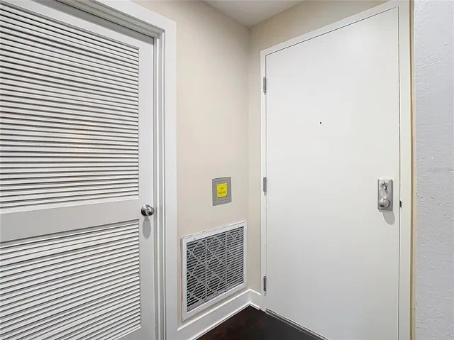 a stove top oven sitting inside of a kitchen