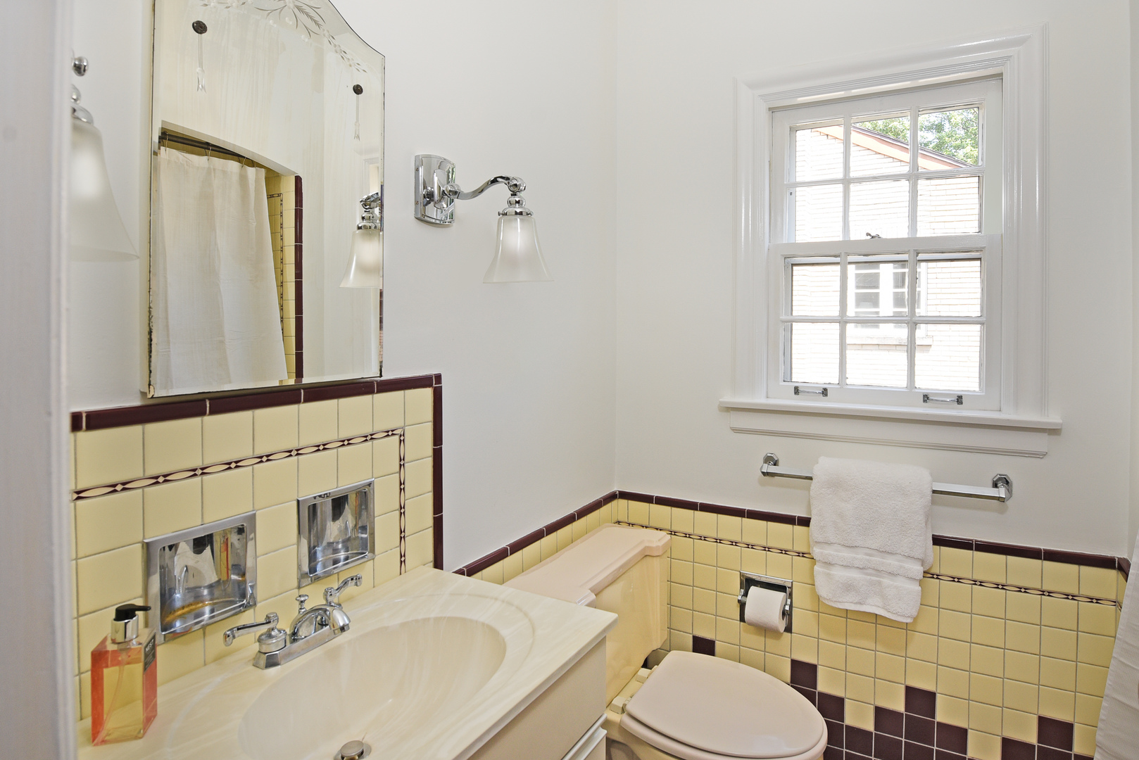 411 Ridge Road Kenilworth, IL 60043 - Photo 29 of 35 a bathroom with a sink vanity mirror and toilet