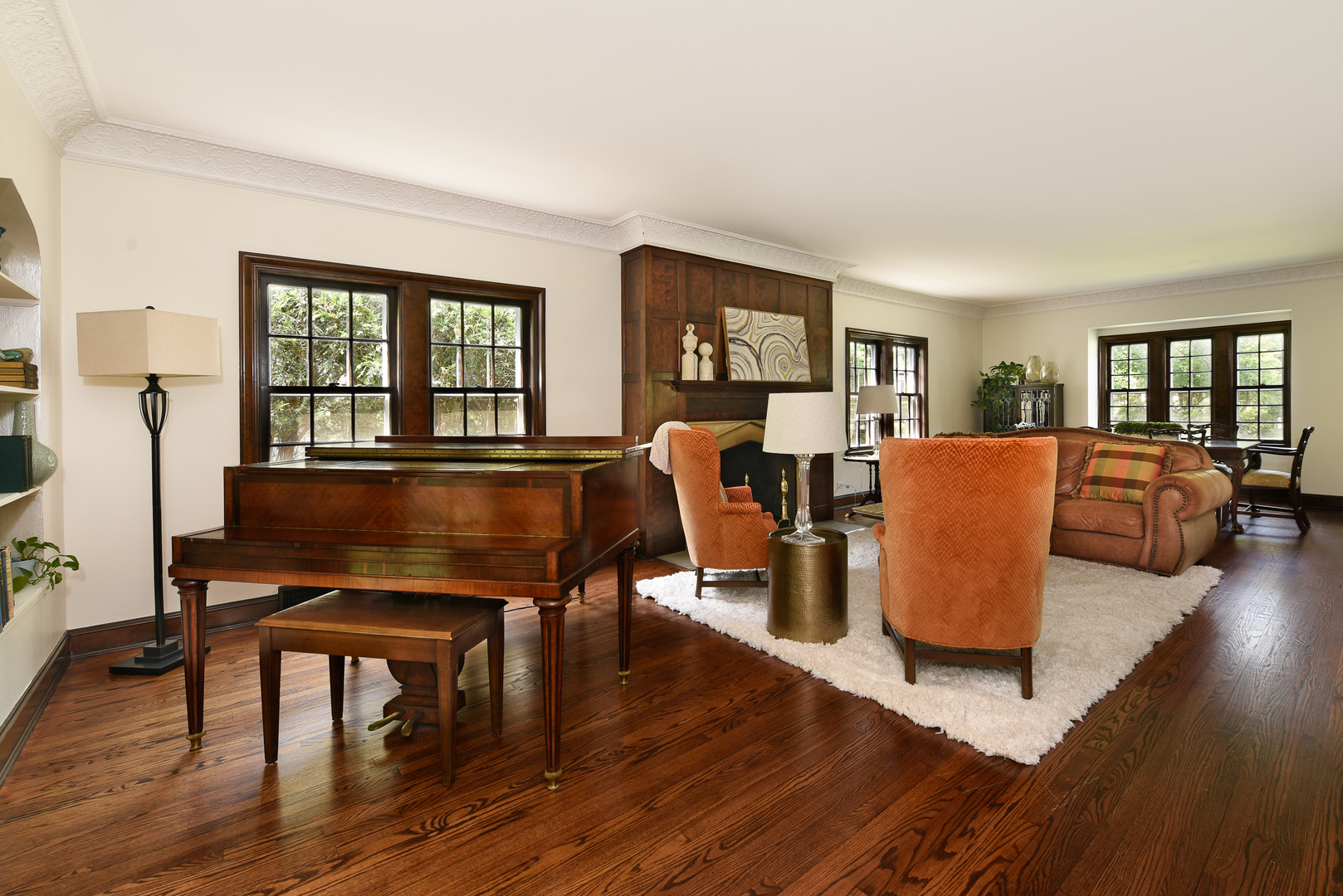 411 Ridge Road Kenilworth, IL 60043 - Photo 3 of 35 a living room with furniture a table and a large window