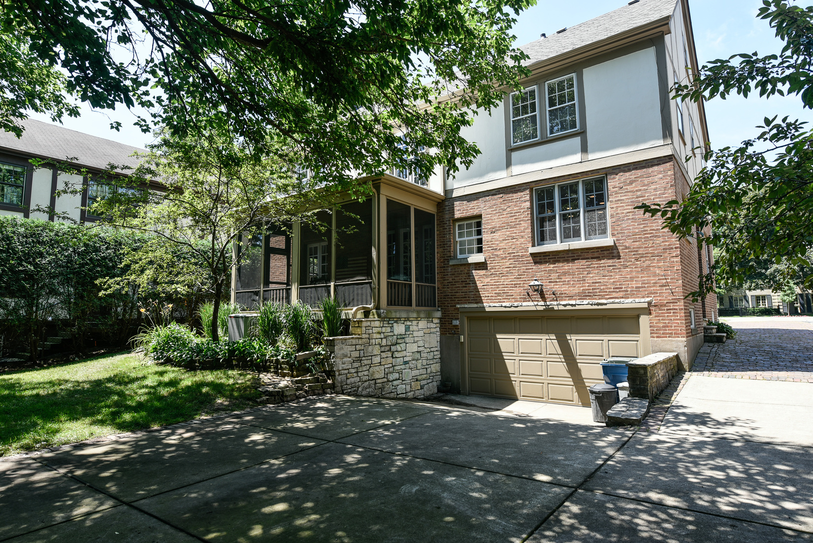 411 Ridge Road Kenilworth, IL 60043 - Photo 34 of 35 a front view of a house with garden