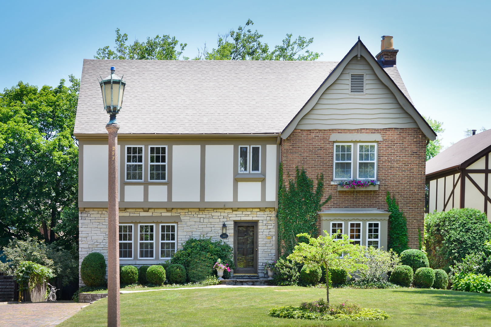 411 Ridge Road Kenilworth, IL 60043 - Photo 35 of 35 a view of outdoor space yard and front view of a house