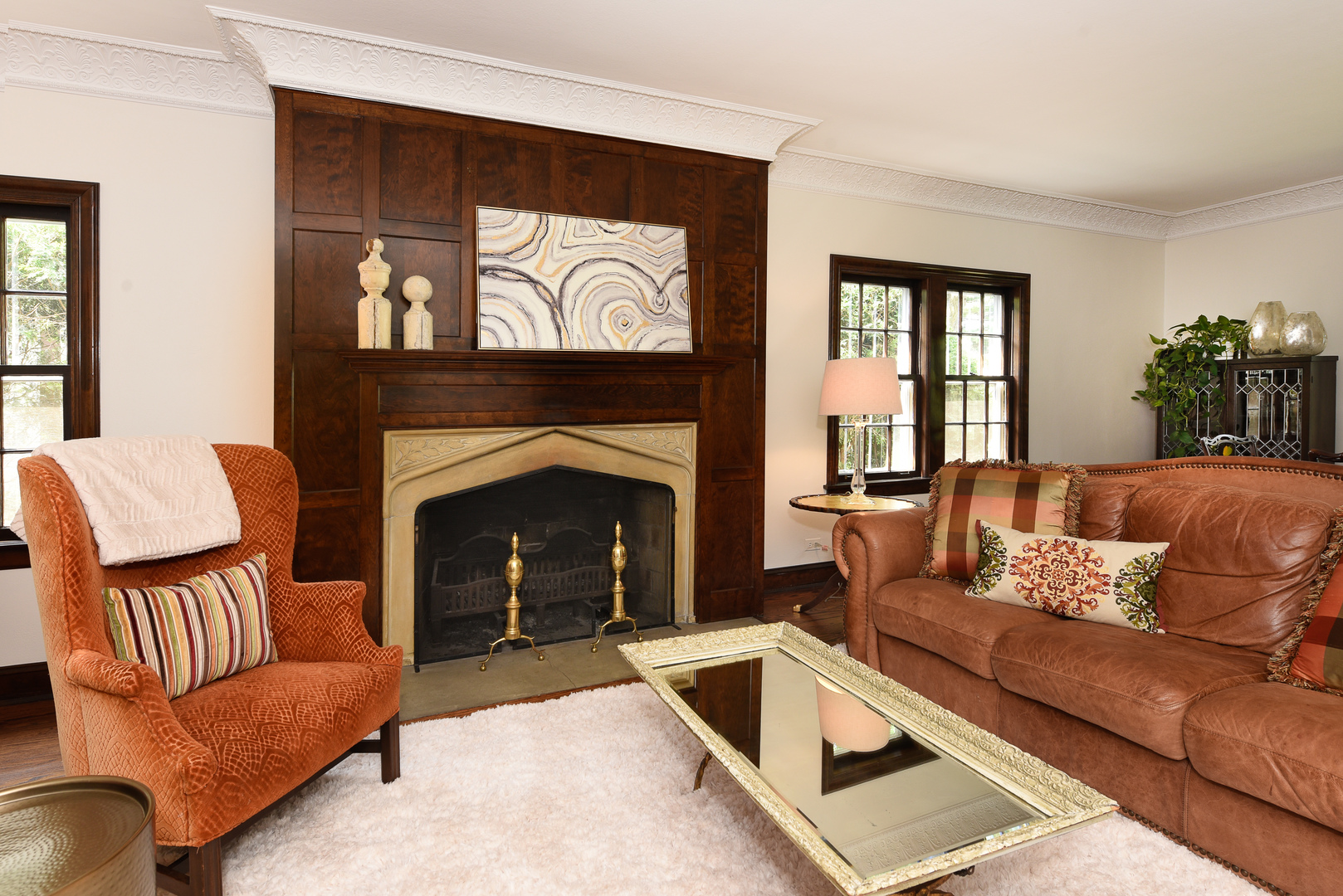 411 Ridge Road Kenilworth, IL 60043 - Photo 4 of 35 a living room with furniture and a fireplace