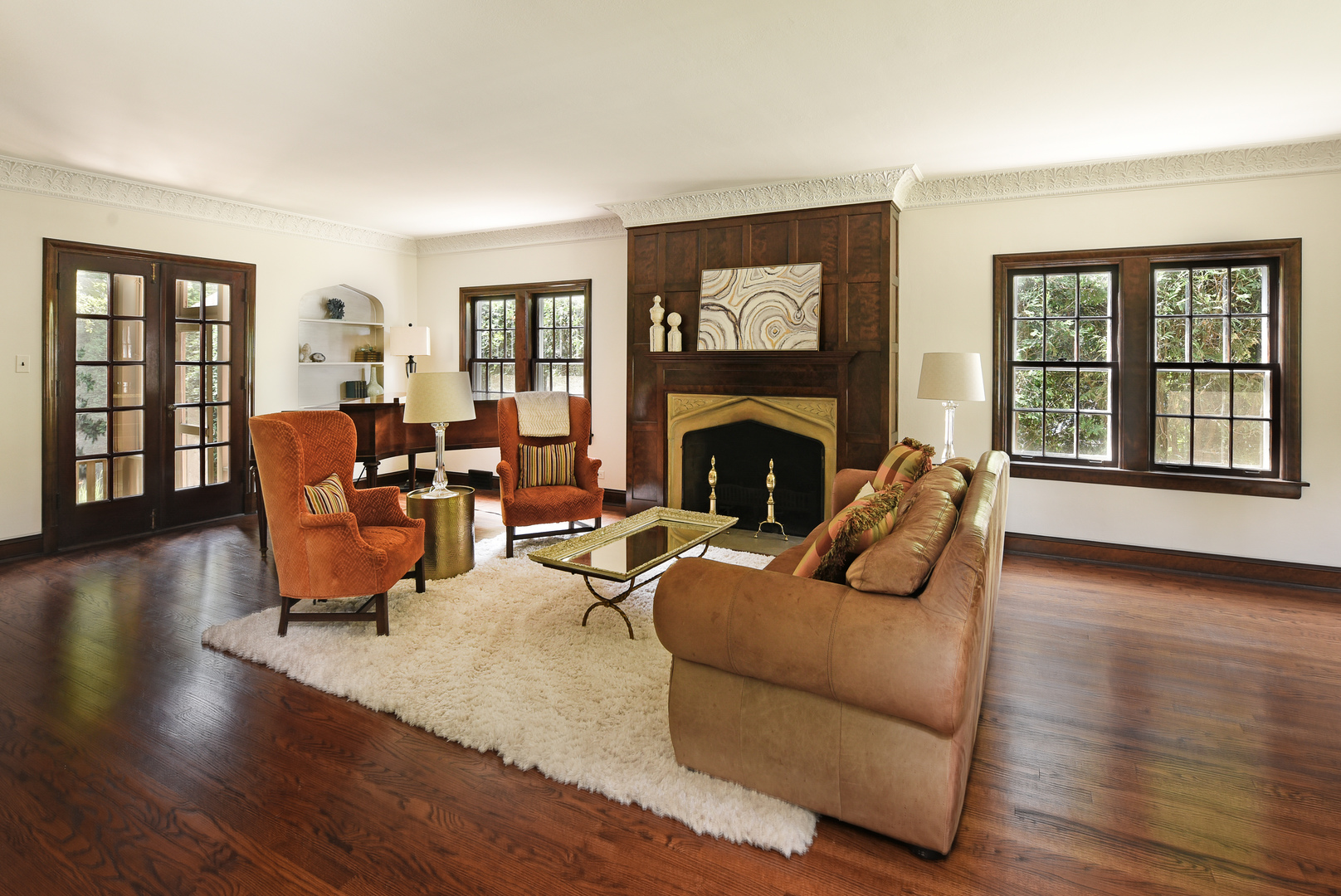 411 Ridge Road Kenilworth, IL 60043 - Photo 6 of 35 a living room with furniture and a fireplace