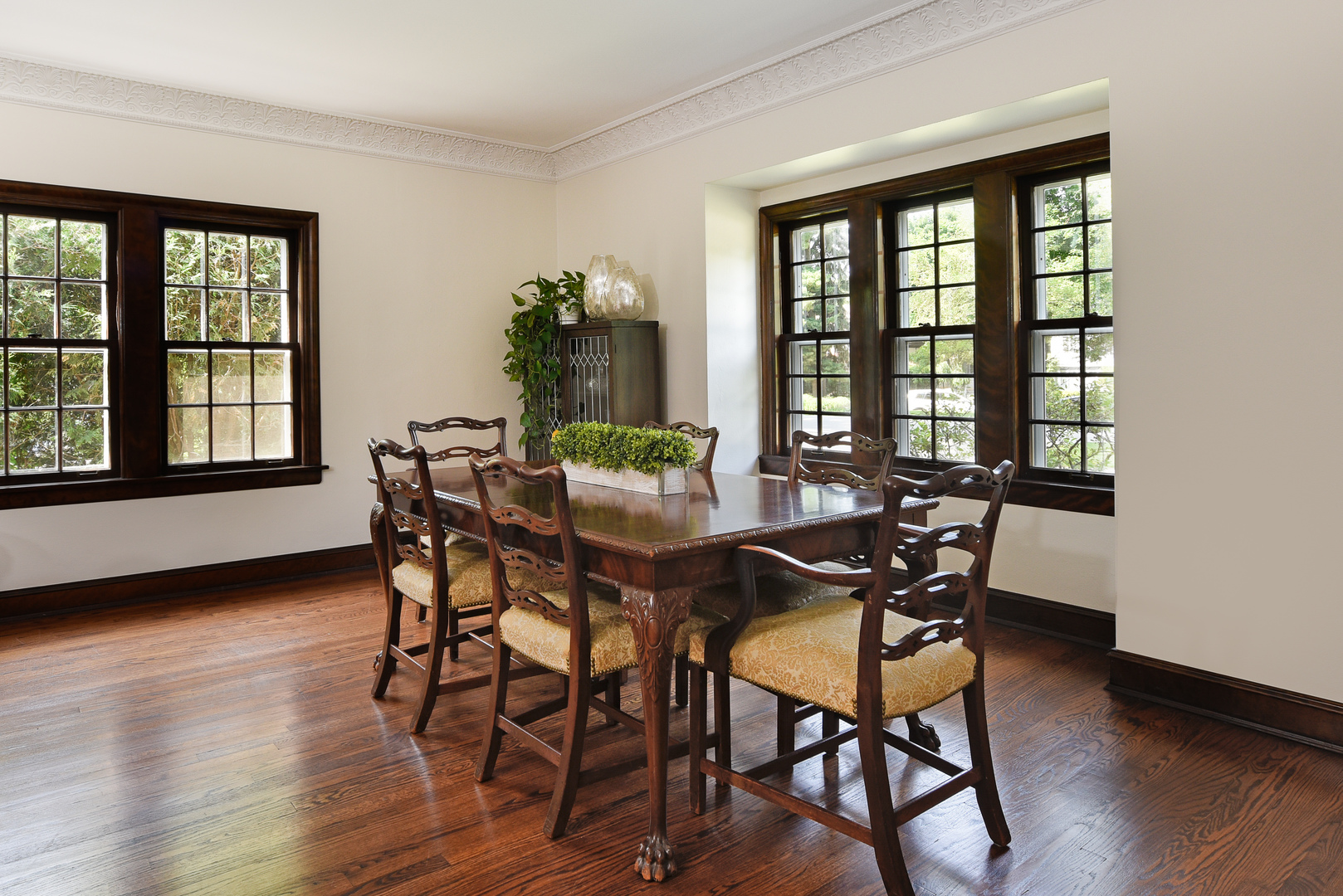 411 Ridge Road Kenilworth, IL 60043 - Photo 8 of 35 a view of a dining room with furniture and wooden floor