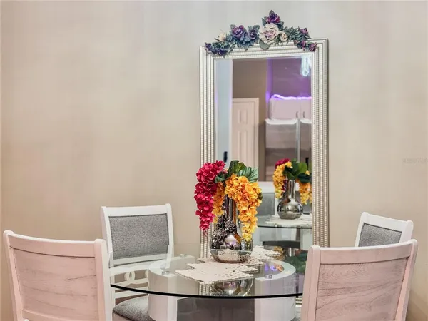 a view of a dining room with furniture