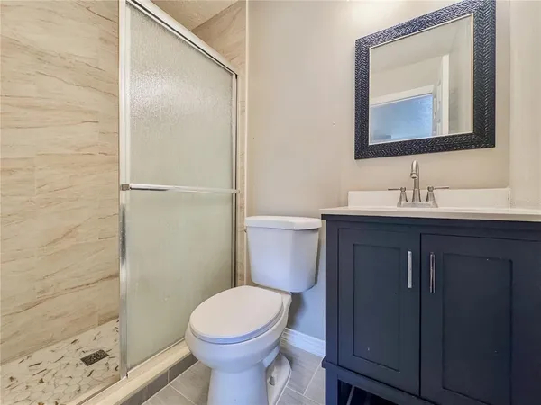 an aerial view of house with yard