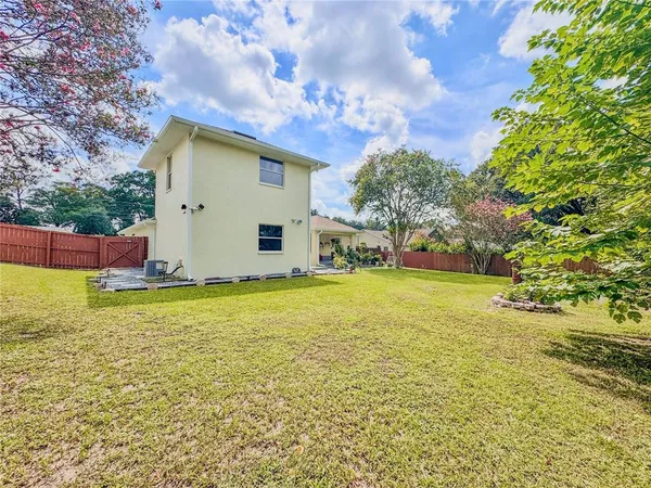 an aerial view of lake and residential houses