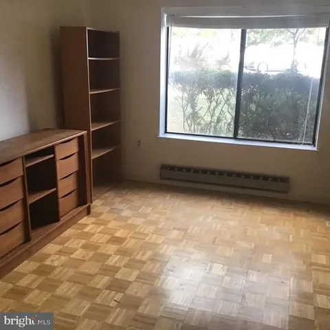 an empty room with a empty space and empty shelves