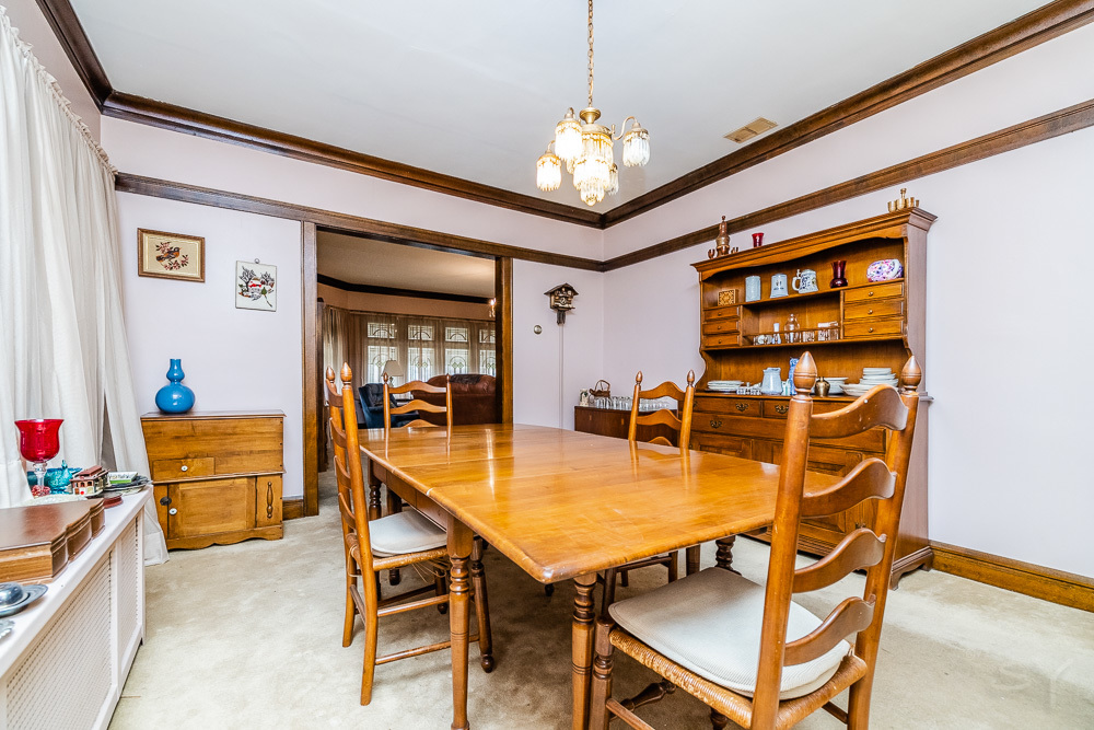 2933 Maple Avenue Berwyn, IL 60402 - Photo 11 of 49 a dining room with furniture and window