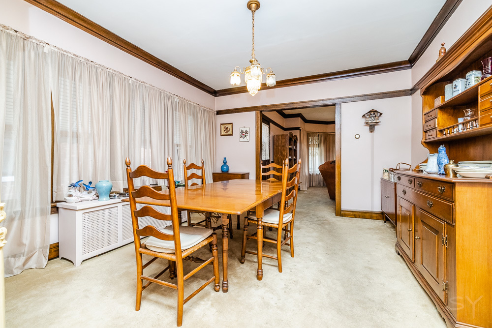 2933 Maple Avenue Berwyn, IL 60402 - Photo 12 of 49 a view of a dining room with furniture window and outside view